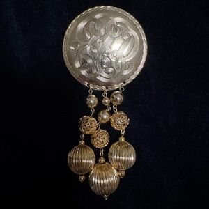 Elegant Silver and Gold Dangle Brooch